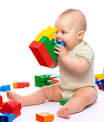 Image showing Little boy with building bricks