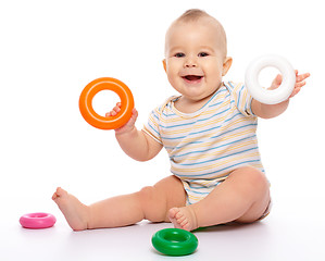 Image showing Little boy play with toys