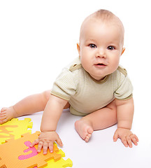 Image showing Little boy play with alphabet