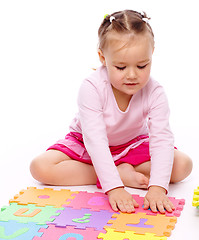 Image showing Little girl with alphabet