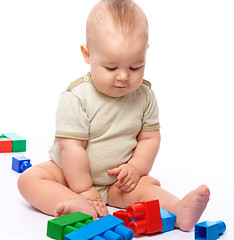 Image showing Little boy with building bricks