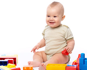 Image showing Little boy with building bricks