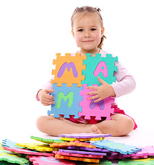 Image showing Little girl with alphabet