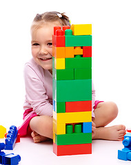 Image showing Little girl with building bricks