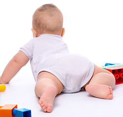 Image showing Little boy with building bricks