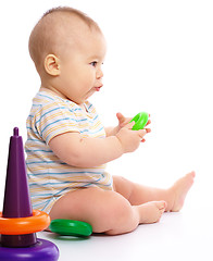 Image showing Little boy play with toys