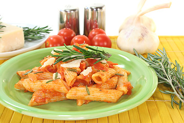 Image showing Penne with tomatoes and Parmesan