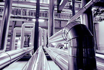 Image showing Equipment, cables and piping as found inside of a modern industr