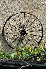 Image showing Old wheel on the wall