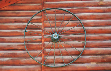 Image showing Old wheel on the wall