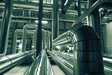 Image showing Equipment, cables and piping as found inside of a modern industr