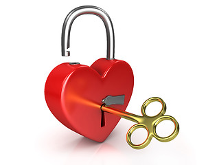 Image showing Opened red lock formed as heart with a golden key in a keyhole v