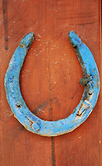 Image showing Horseshoe on door