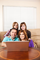 Image showing Family at home browsing internet