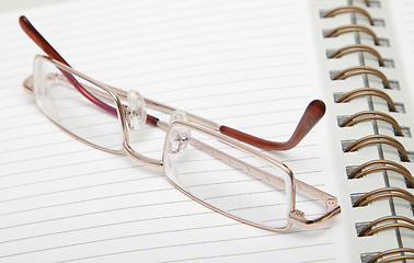 Image showing Diary and reading glasses