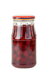 Image showing Glass jar with jam maded from cornelian cherries