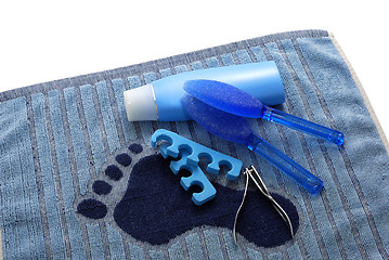 Image showing Blue foot SPA on towel with footprint