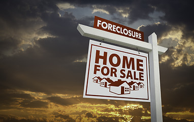 Image showing White Foreclosure Home For Sale Real Estate Sign Over Sunset Sky