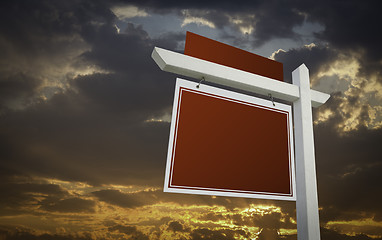 Image showing Blank Red Real Estate Sign Over Sunset Sky