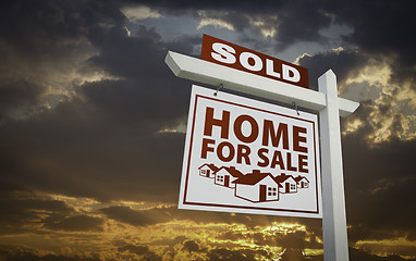 Image showing White Sold Home For Sale Real Estate Sign Over Sunset Sky