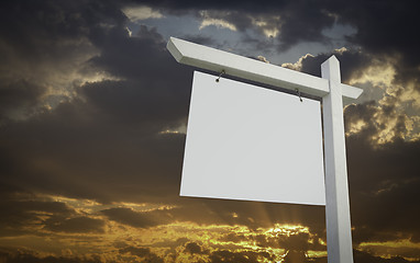 Image showing Blank White Real Estate Sign Over Sunset Sky