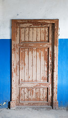 Image showing The closed old decayed door