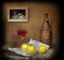 Image showing Glass of wine and apples