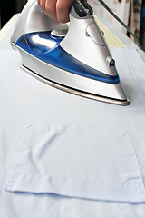 Image showing Ironing Clothes