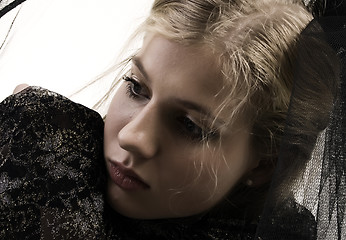 Image showing young sad blonde