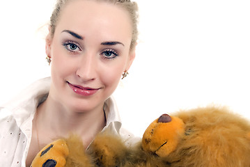 Image showing Young woman with teddy bear  