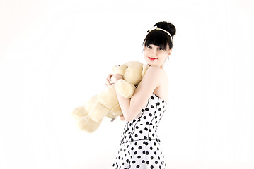 Image showing Young woman with teddy bear 