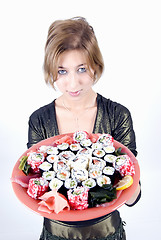 Image showing girl with sushi  