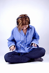 Image showing Young girl in headphones   