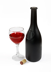 Image showing Red wine bottle, glass of wine and stopper