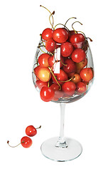 Image showing The glass and sweet cherry