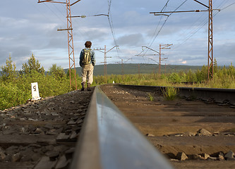 Image showing The guy leaving afar