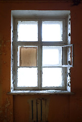 Image showing The closed old decayed window