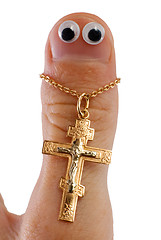 Image showing Finger and a cross