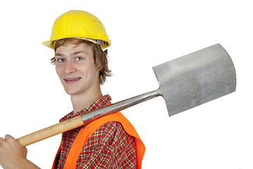 Image showing Young worker with spade