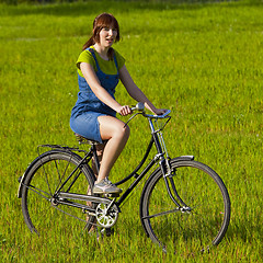 Image showing Riding a bicycle