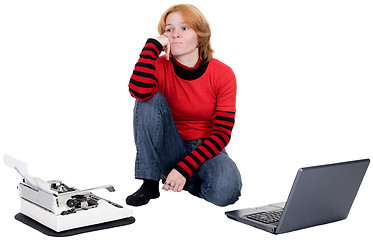 Image showing Girl with the laptop and a typewriter