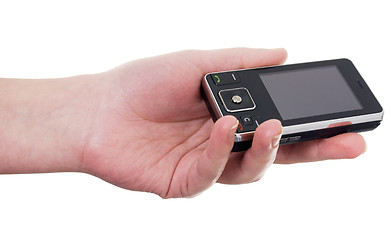 Image showing Hand with a cellular telephone