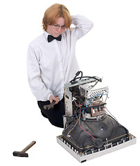 Image showing Girl repairing electronic equipment