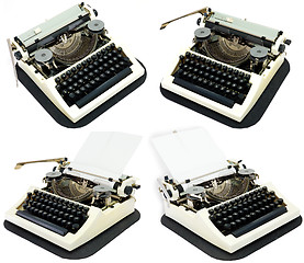 Image showing Ancient typewriters on a white