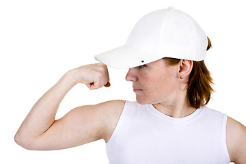 Image showing The strong girl in a cap