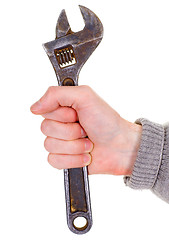 Image showing Big wrench in a man's hand