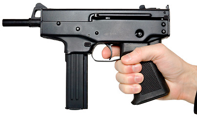 Image showing Hand holding the big pistol