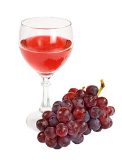 Image showing Red wine and grapes cluster