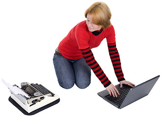 Image showing Girl with the laptop and a typewriter