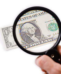 Image showing Counterfeit dollar on magnifier